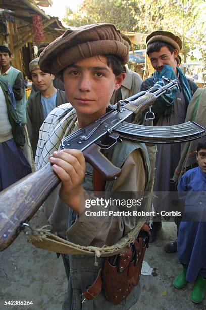 Twelve-year-old Shukrullah is ready to join the Northern Alliance forces.