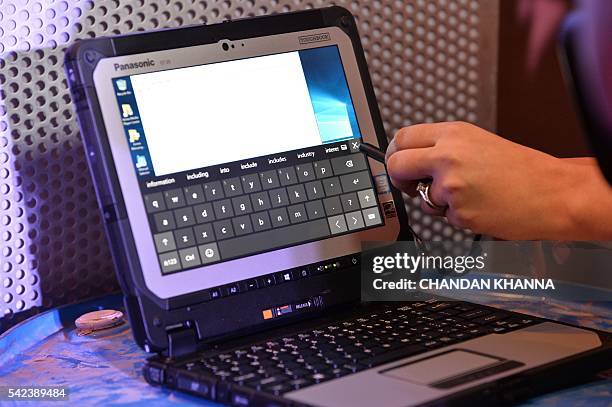 The Panasonic Toughbook CF-20 is showcased at its launch in New Delhi on June 23, 2016. / AFP / CHANDAN KHANNA