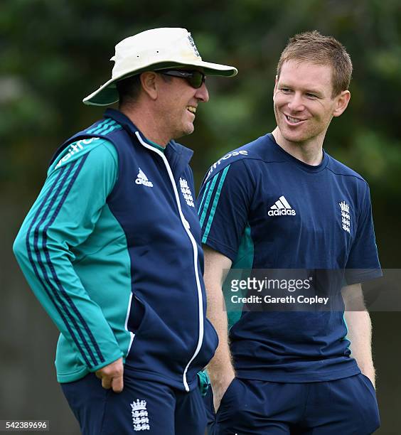 England captain Eoin Morgan speaks with coach Trevor Bayliss during a nets session at Edgbaston on June 23, 2016 in Birmingham, England.