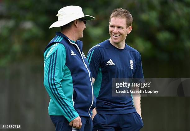 England captain Eoin Morgan speaks with coach Trevor Bayliss during a nets session at Edgbaston on June 23, 2016 in Birmingham, England.