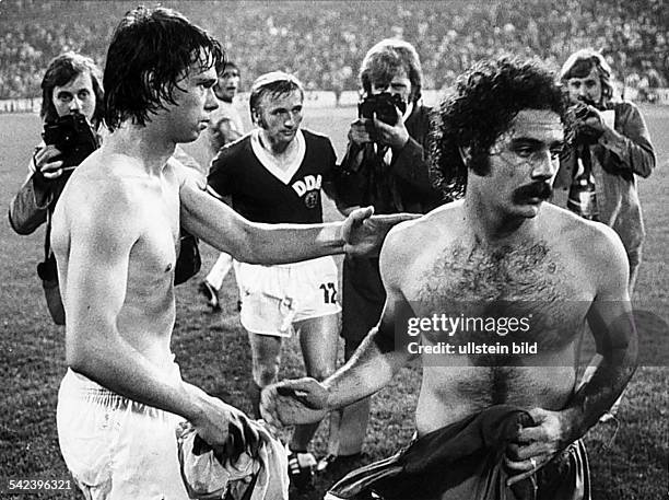 World Cup in Germany Juergen Sparwasser and Rivelino are swapping shirts after the 2nd round fixture Brazil East Germany in Gelsenkirchen -