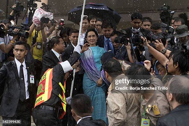 Aung San Suu Kyi greets Burmese immigrants at Talad Talay Thai Hall on June 23, 2016 in Bangkok, Thailand. Myanmar's Aung San Suu Kyi arrived in...