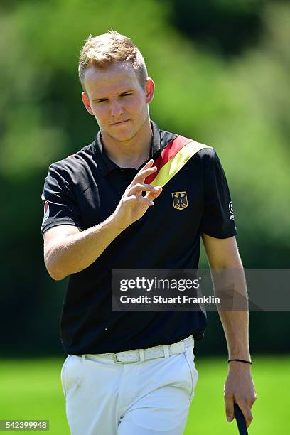 Amateur Yannik Paul of Germany waves during the first round of the BMW International Open at Gut Larchenhof on June 23, 2016 in Cologne, Germany.
