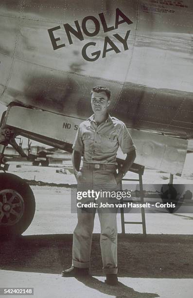 Colonel Paul Tibbets, who commanded the plane which dropped the atomic bomb on Hiroshima, standing by the Enola Gay.