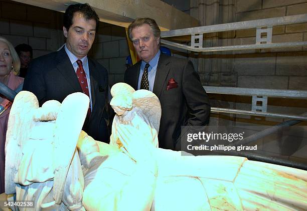 Prince Charles Emmanuel de Bourbon Parme, Prince Jacques de France and the Duke of Orleans stand in front of the recumbant figure of Agnes Sorel, the...