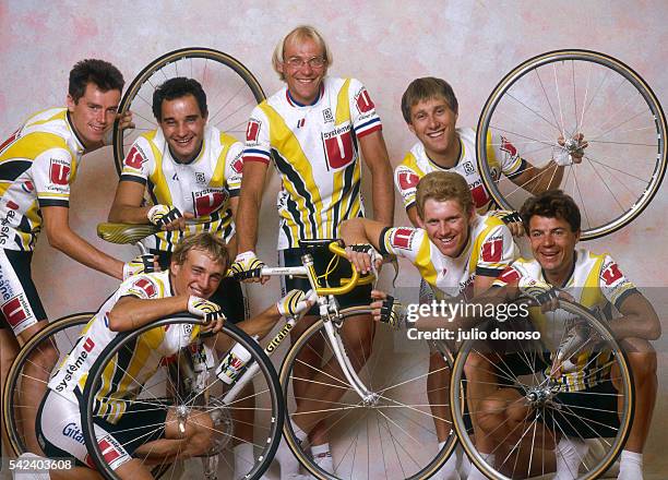 Champion cyclist Laurent Fignon poses with the Systeme U bicycling team. The team is participating in the 1988 Tour de France.