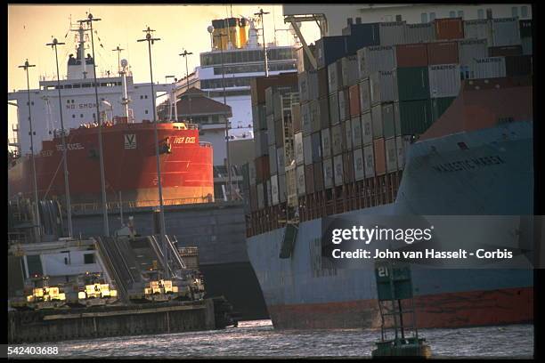 Gates of the Gatun locks open for a cruise ship making its way down to the Caribbean end of the canal. The gates at both ends of the upper chamber...