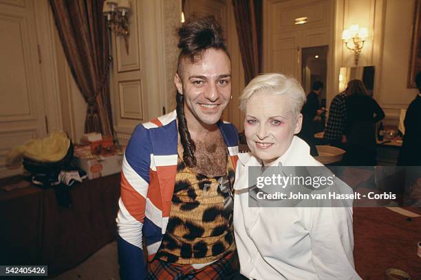 British fashion designers John Galliano and Vivienne Westwood attend the1993 Spring Summer Pret a Porter catwalk show.