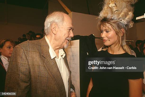 Fashion model Claudia schiffer and director Robert Altman during Paris Fashion Week's Ready-to-Wear Spring/Summer 1994 show.