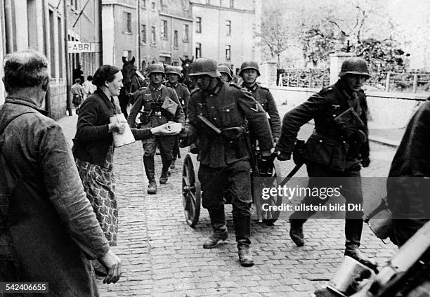 Campaign in the west / battle of France 1940 :Belgium - german troops, entering the Eupen-Malmedy region - are welcomed by the german majority of the...