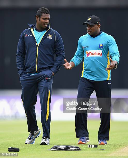 Sri Lanka captain Angelo Mathews speaks with Chairman of Selectors Sanath Jayasuriya during a nets session at Edgbaston on June 23, 2016 in...