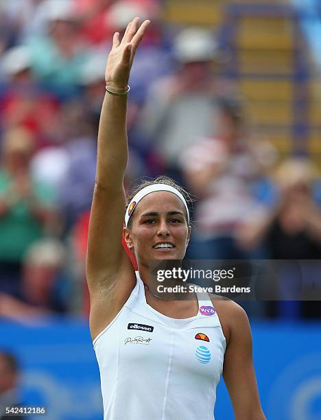 Monica Puig of Puerto Rico celebrates her victory during her quarter final women's singles match against Kristina Mladenovic of France on day five of...