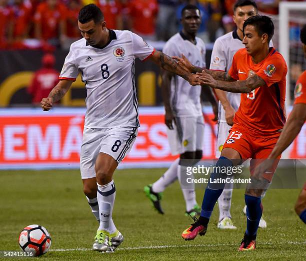 Edwin Cardona of Colombia fights for the ball with Erick Pulgar of Chile during a Semifinal match between Colombia and Chile at Soldier Field as part...