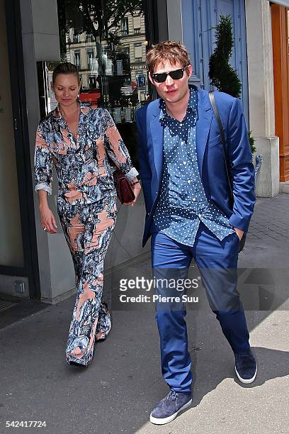 Kate Moss and Nikolai Von Bismarrck leave a restaurant on June 23, 2016 in Paris, France.