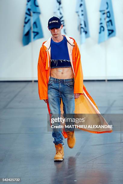 Model presents a creation by Andrea Crews during the men's Spring/Summer 2017 collection fashion show on June 23, 2016 in Paris. / AFP / MATTHIEU...