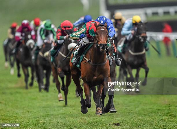 March 2015; Moon Racer with Tom Scudamore up, on their way to winning the Champion Bumper. Cheltenham Racing Festival 2015, Prestbury Park,...