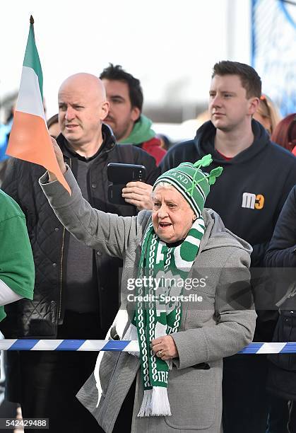 March 2015; Ireland supporter Betty Corcoran, originally from Bray, Co. Wicklow, but living in Airdrie, Scotland, cheers the Ireland team's arrival...