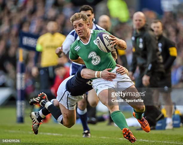 March 2015; Luke Fitzgerald, Ireland, is tackled by Stuart Hogg, Scotland. RBS Six Nations Rugby Championship, Scotland v Ireland. BT Murrayfield...