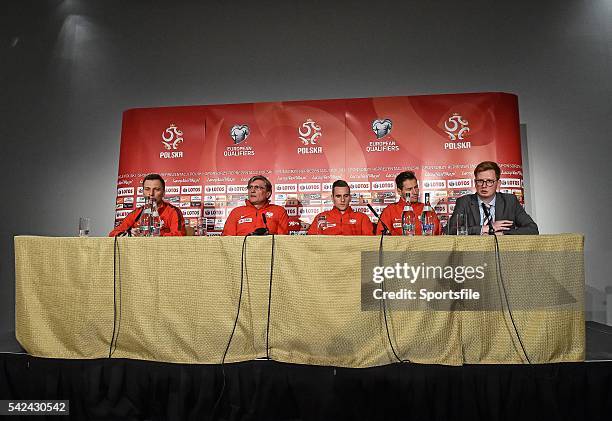 March 2015; Poland head coach Adam Nawalka, with players Arkadiusz Milik and Grzegorz Krychowiak, during a press conference. Marker Hotel, Dublin....