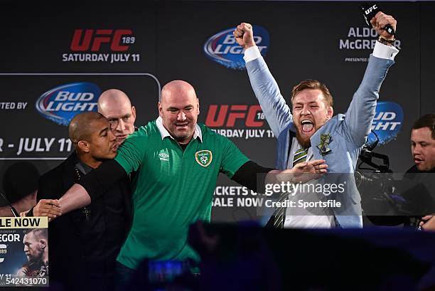 March 2015; UFC featherweight Conor McGregor, right, is restrained by UFC President Dana White from UFC featherweight Champion Jose Aldo during a fan...