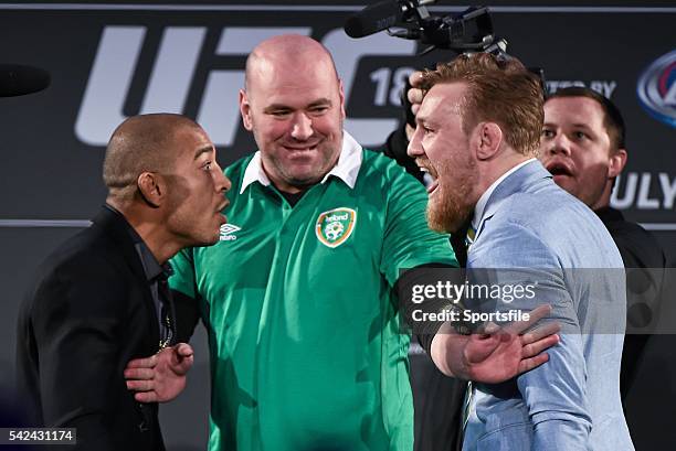 March 2015; UFC featherweight Champion Jose Aldo, left, faces off against UFC featherweight title challenger Conor McGregor as UFC President Dana...