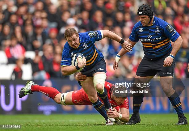 April 2015; Sean Cronin, Leinster, supported by teammate Mike Ross, is tackled by Bakkies Botha, RC Toulon. European Rugby Champions Cup Semi-Final,...