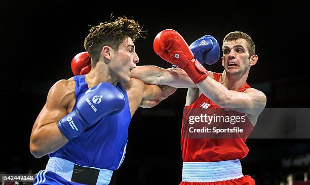 June 2015; Adam Nolan, Ireland, right, exchanges punches with Josh Kelly, Great Britain, during their Men's Boxing Welter 69kg Quarter Final bout....