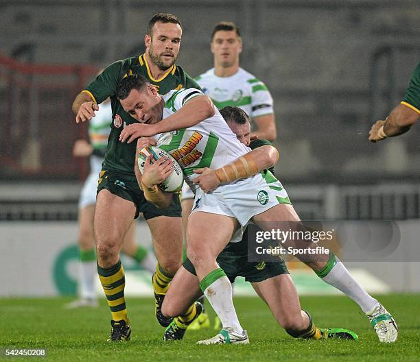 November 2013; Brett White, Ireland, is tackled by Paul Gallen and Nate Myles, Australia. Rugby League World Cup, Group A, Ireland v Australia,...