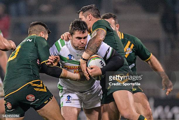 November 2013; Luke Ambler, Ireland, is tackled by James Tamou and Corey Parker, Australia. Rugby League World Cup, Group A, Ireland v Australia,...