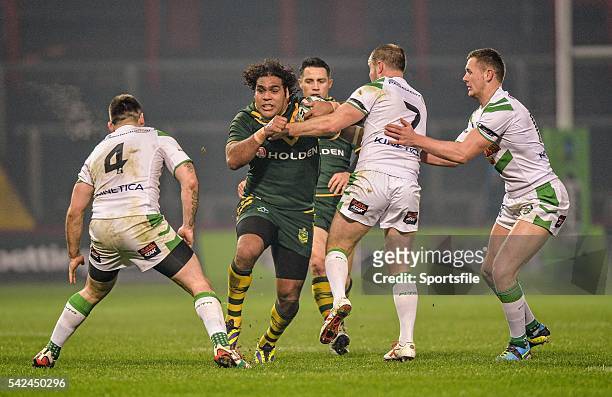 November 2013; Sam Thaiday, Australia, is tackled by Joshua Toole, left, Liam Finn, centre, and Ben Currie, Ireland. Rugby League World Cup, Group A,...