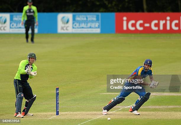 July 2015; JJ Smit, Namibia, hits a run as the Ireland wicketkeeper Gary Wilson keeps a close eye. ICC World Twenty20 Qualifier 2015, Ireland v...