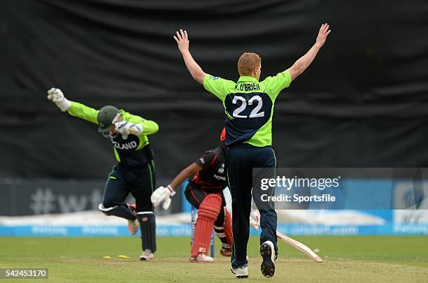 July 2015; Gary Wilson, Ireland, left, celebrates after stumping Nizakat Khan, Hong Kong, from the bowl of Kevin O'Brien. ICC World Twenty20...