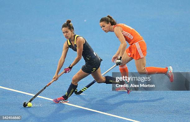 Brooke Peris of Australia handles the ball against Michelle van der Pols of Netherlands during the FIH Women's Hockey Champions Trophy match between...