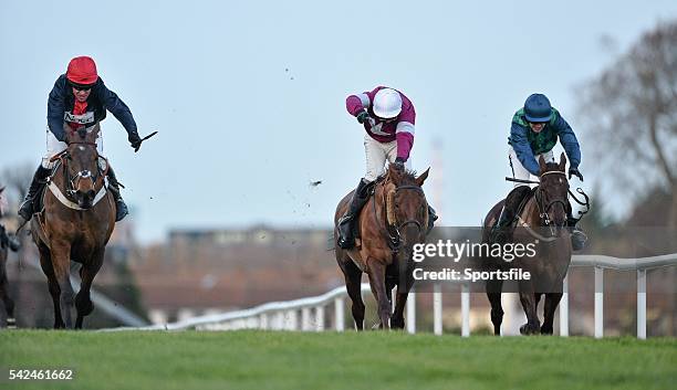 December 2013; Bobs Worth, with Barry Geraghty up, left, crosses the finish line ahead of First Lieutenant, centre, with David Casey up, and third...