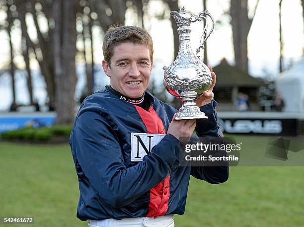 December 2013; Jockey Barry Geraghty with the Lexus Steeplechase Trophy after victory on board his mount Bobs Worth. Leopardstown Christmas Racing...