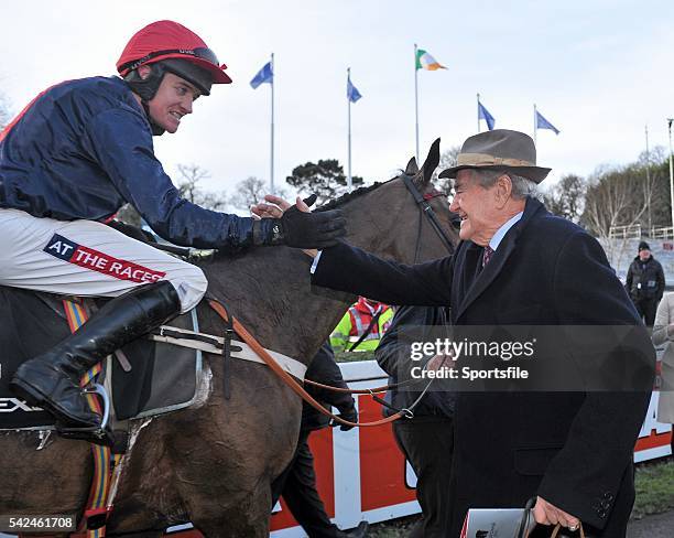 December 2013; Jockey Barry Geraghty is greeted by part- owner Malcolm Kimmins after Bobs Worth won The Lexus Steeplechase. Leopardstown Christmas...