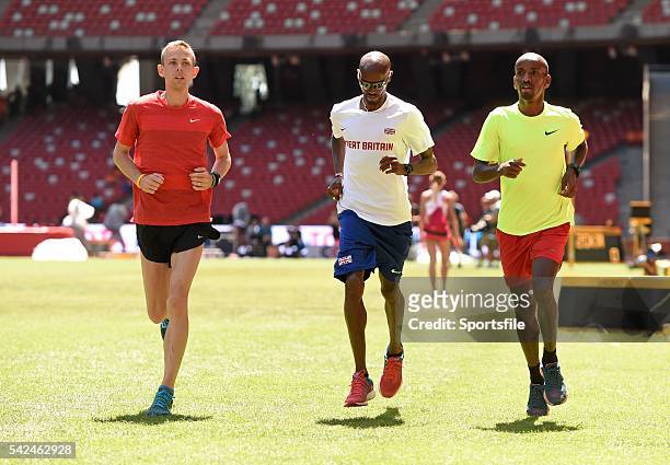 August 2015; Athletes, from left, Galen Rupp of the United States, Mo Farah of Great Britain and Bashir Abdi of Belgium ahead of the IAAF World Track...