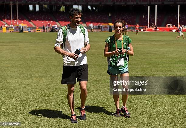 August 2015; Irish athletes Brian Murphy, a member of the 4x400m relay team, and Ciara Everard, women's 800m event, walk around the stadium ahead of...