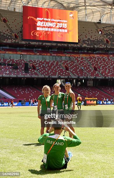 August 2015; Irish 3000m steeplechase athletes, from left, Michelle Finn, Sara Treacy and Kerry O'Flaherty have their picture taken by coach Paul...