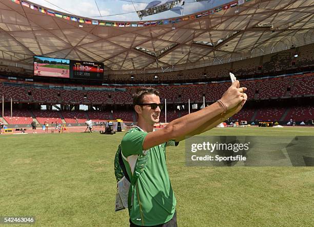 August 2015; Ireland's Timmy Crowe, a member of the 4x400m relay team takes some pictures ahead of the IAAF World Track & Field Championships at the...