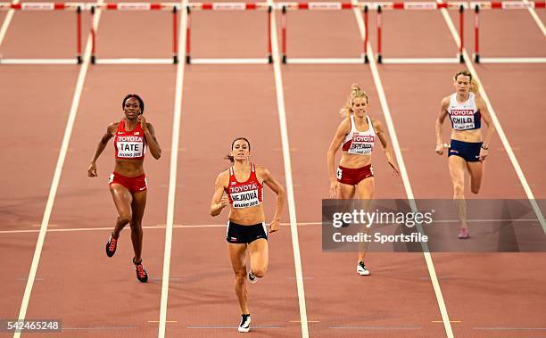 August 2015; Zuzana Hejnova of the Czech Republic on her way to winning the final of the Women's 400m Hurdles event. IAAF World Athletics...