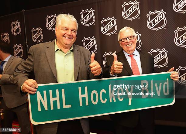 Clark County Commissioner Steve Sisolak and Bill Foley celebrate the admittance of a new NHL franchise during the Board Of Governors Press Conference...
