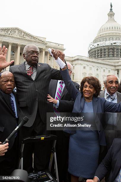 Reps. John Lewis , James Clyburn , Maxine Waters and Charles Rangel, speak with supporters outside the U.S. Capitol building June 23, 2016 in...