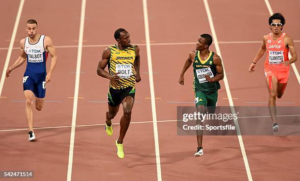 August 2015; Athletes, from left, Daniel Taylor of Great Britain, Usain Bolt of Jamaica, left, Anaso Jobodwana of South Africa and Kenji Fujimitsu of...