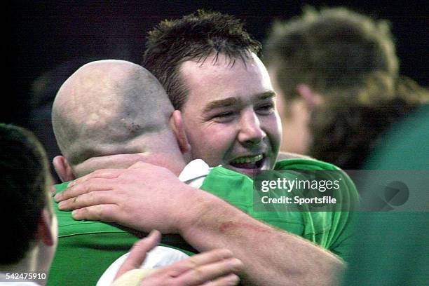 February 2000; Ireland's Anthony Foley, right, celebrates victory with team-mate Keith Wood. Six Nations Rugby International, Ireland v Scotland,...