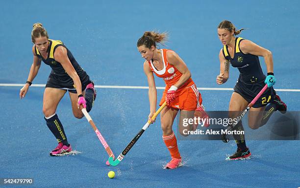 Ellen Hoog of Netherlands runs with the ball during the FIH Women's Hockey Champions Trophy match between Australia and Netherlands at Queen...