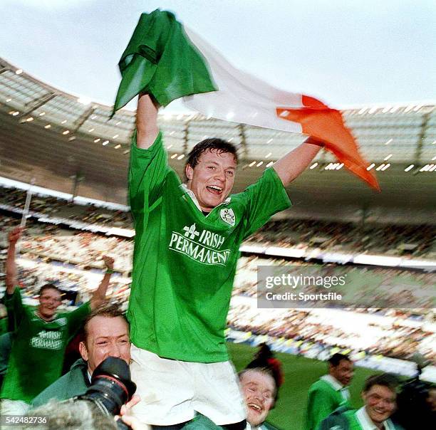 March 2000; Ireland's three try hero Brian O'Driscoll is held aloft by team-mates Trevor Brennan and Frank Sheahan after victory over France. Six...