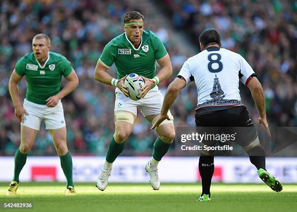 September 2015; Jamie Heaslip, Ireland, in action against Daniel Carpo, Romania. 2015 Rugby World Cup, Pool D, Ireland v Romania, Wembley Stadium,...