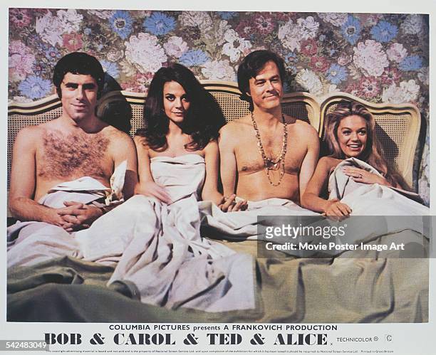 From left to right, actors Elliott Gould, Natalie Wood, Robert Culp and Dyan Cannon appear on the poster for the Columbia Pictures film 'Bob & Carol...