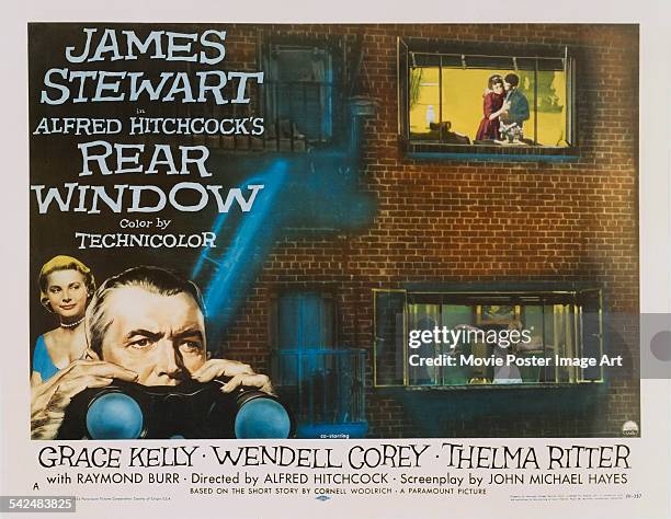 Actors James Stewart and Grace Kelly appear on the poster for the Paramount Pictures film 'Rear Window', 1954. The film was directed by Alfred...